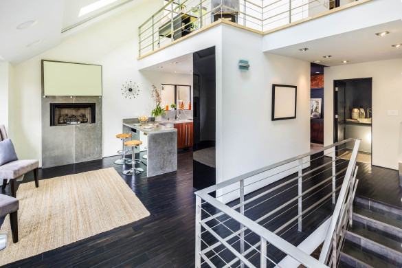bright-modern-contemporary-two-story-loft-shutterstock_311042828-2-585x390
