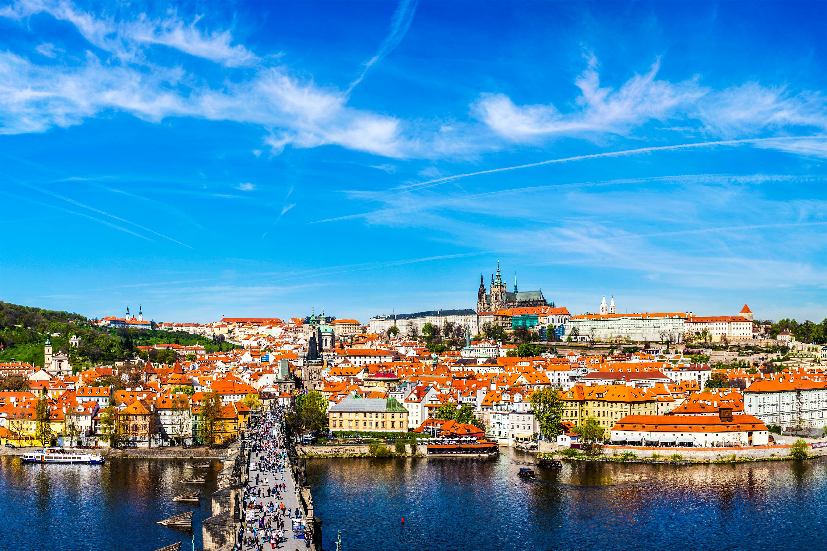 Prague: Mala Strana, Charles bridge and Prague castle view from Old Town bridge tower over Vltava river in daytime. Prague, Czech Republic